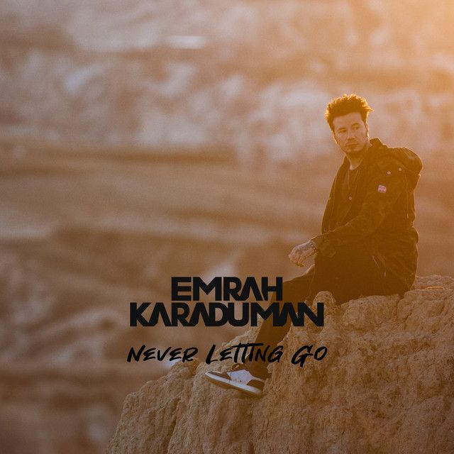 متن آهنگ Never Letting Go از Emrah Karaduman کاور آهنگ Never Letting Go از Emrah Karaduman